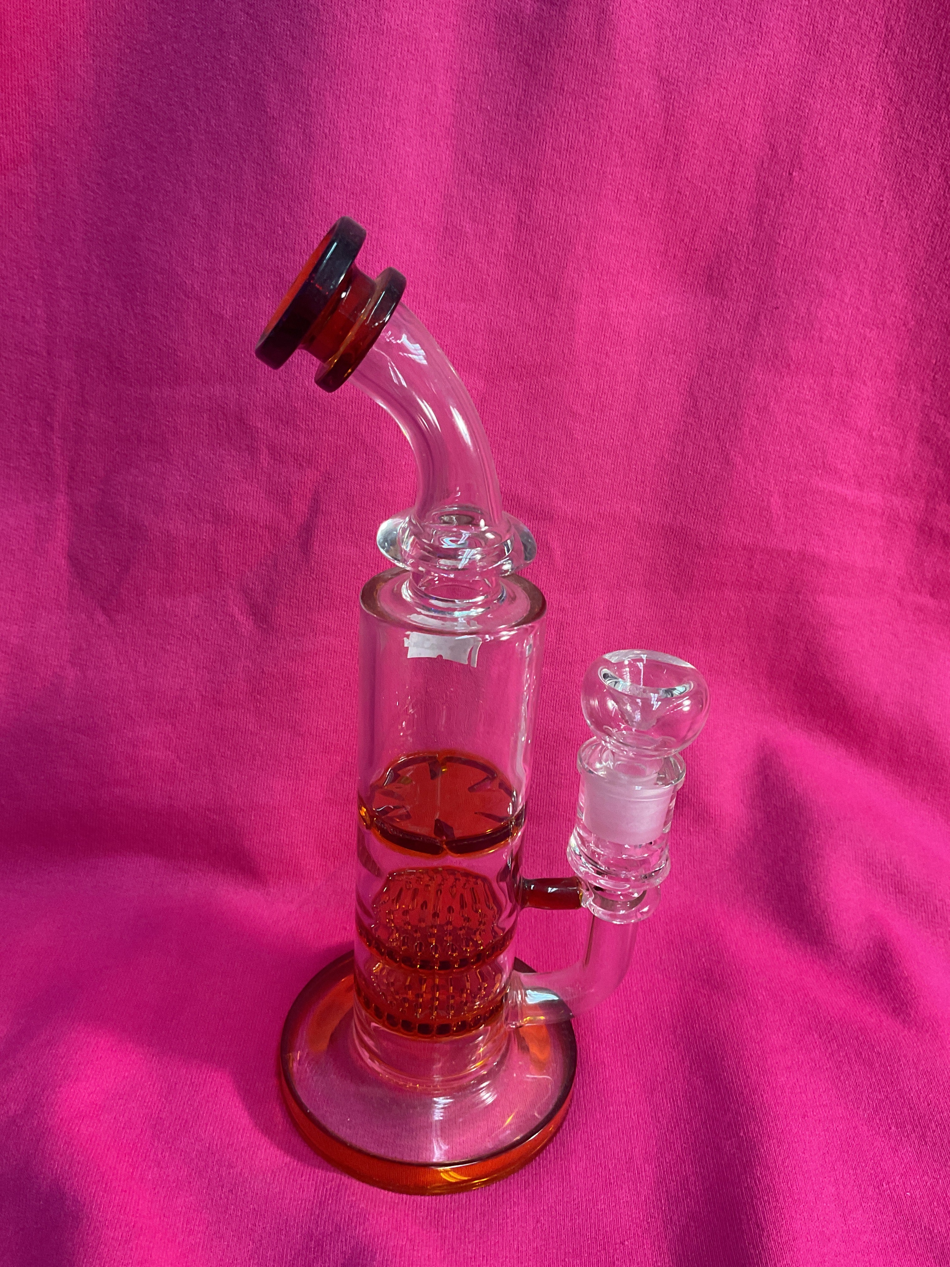 Brown and clear glass water pipe